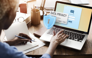A woman uses a secured website on her laptop