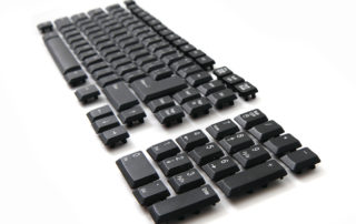 Just the keys from a keyboard, arranged in order, on a white background.