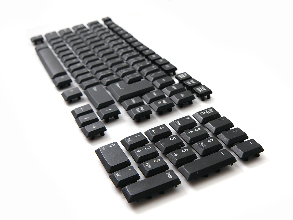 Just the keys from a keyboard, arranged in order, on a white background.